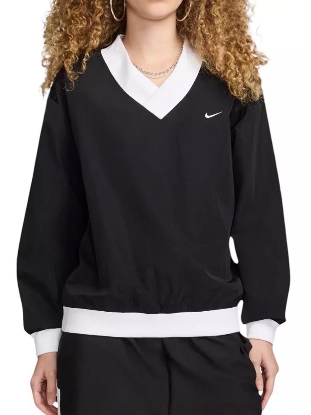 Nike Sportswear Essential Women's Loose UV Woven Long-Sleeve V-
Neck sweater top